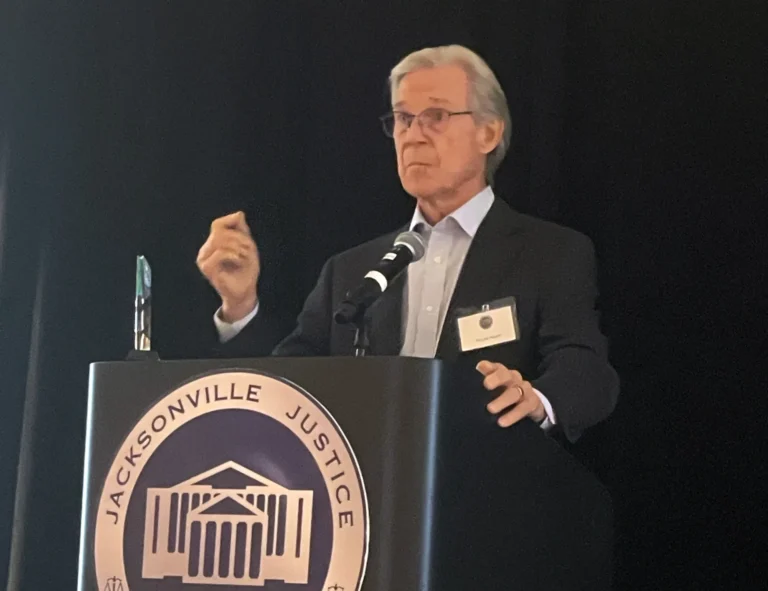 Wayne Hogan receiving Michelline Hayes Ruth Award